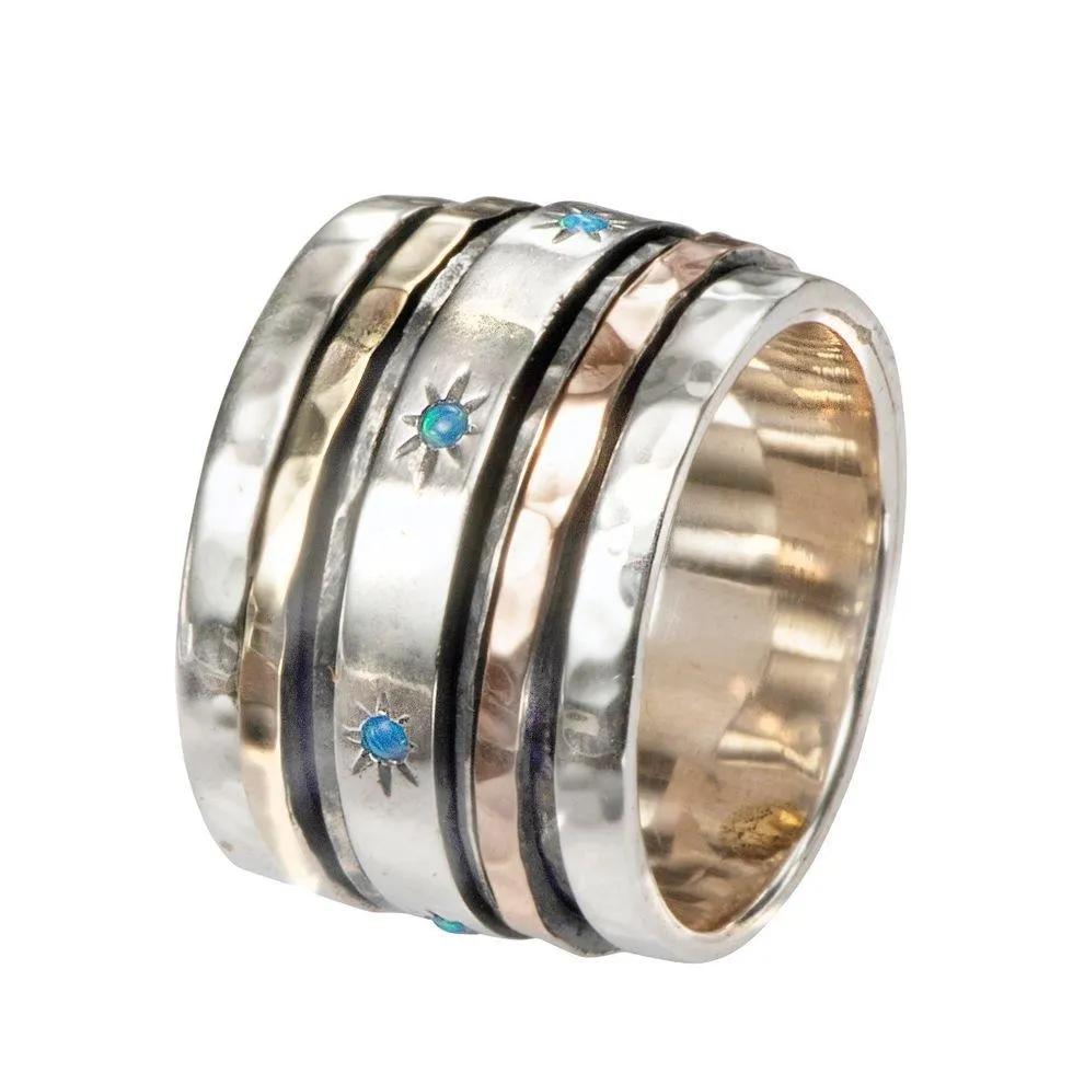 Israeli spinner rings Silver and blue opals