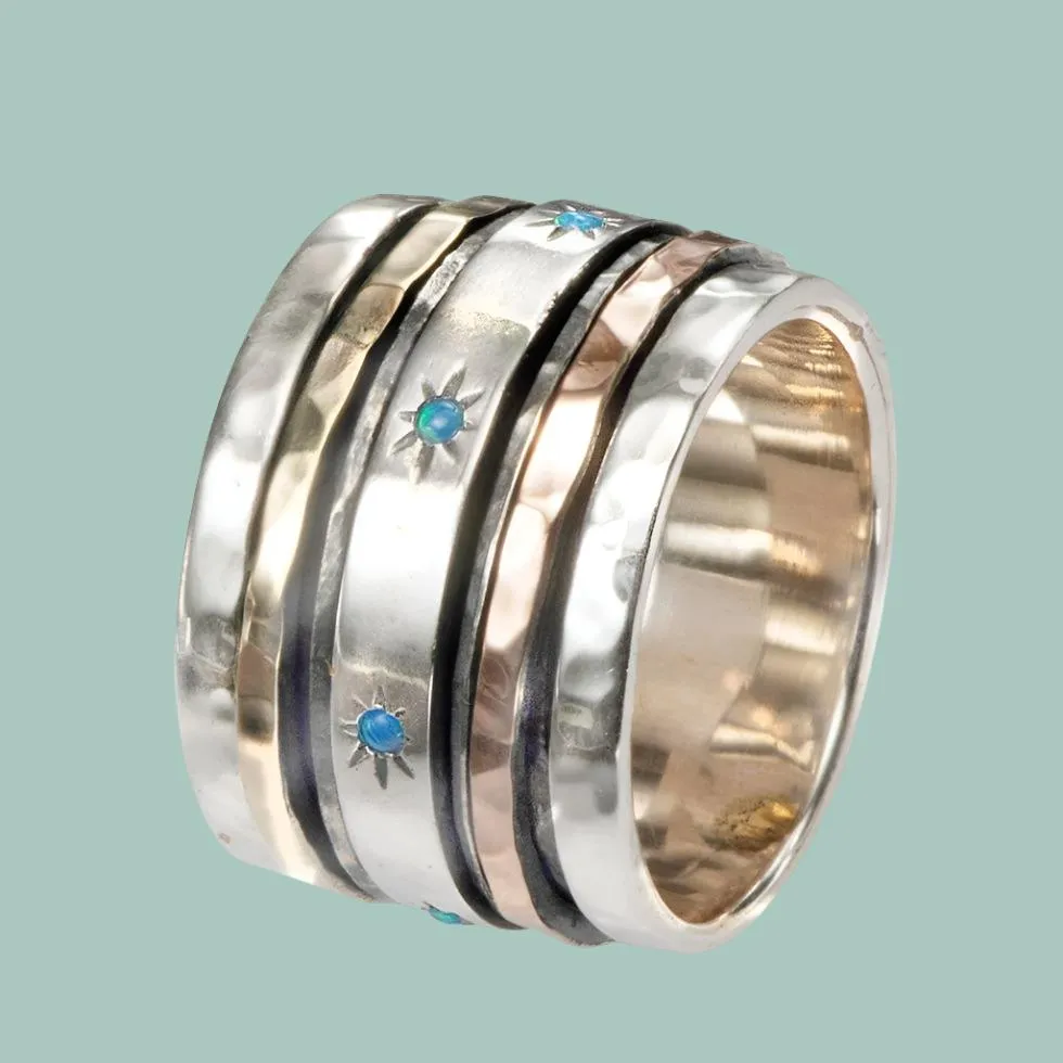 Israeli spinner rings Silver and blue opals