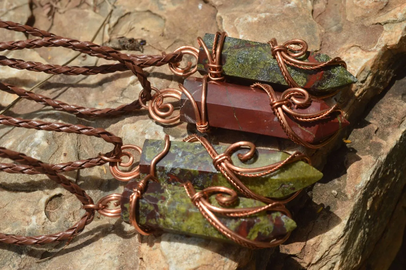 Polished Bastite (Epidote Piemontite) Dragons Blood Stone Crystals Set In Copper Art Wire Wrap Pendant - sold per piece - South Africa