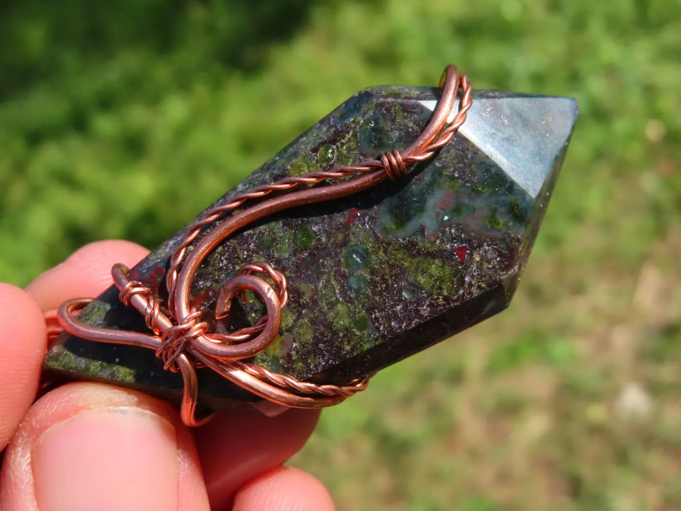 Polished Rare Bastite (Epidote & Piedmontite) Dragon Blood Stone Free forms Set In Copper Art Wire Wrap Pendant - sold per piece From South Africa