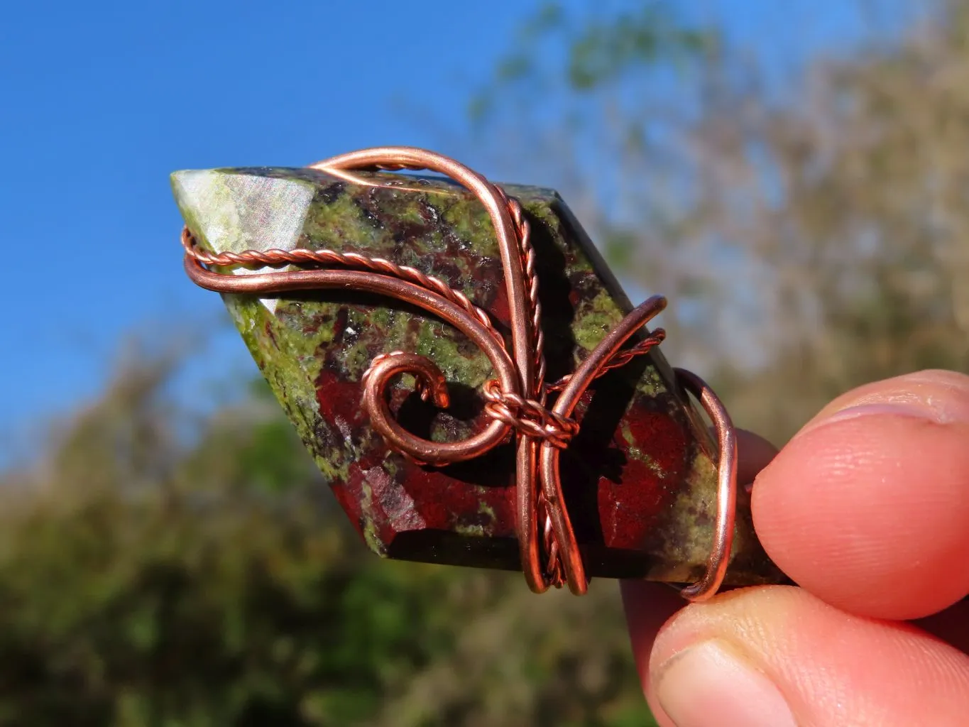 Polished Rare Bastite (Epidote & Piedmontite) Dragon Blood Stone Free forms Set In Copper Art Wire Wrap Pendant - sold per piece From South Africa