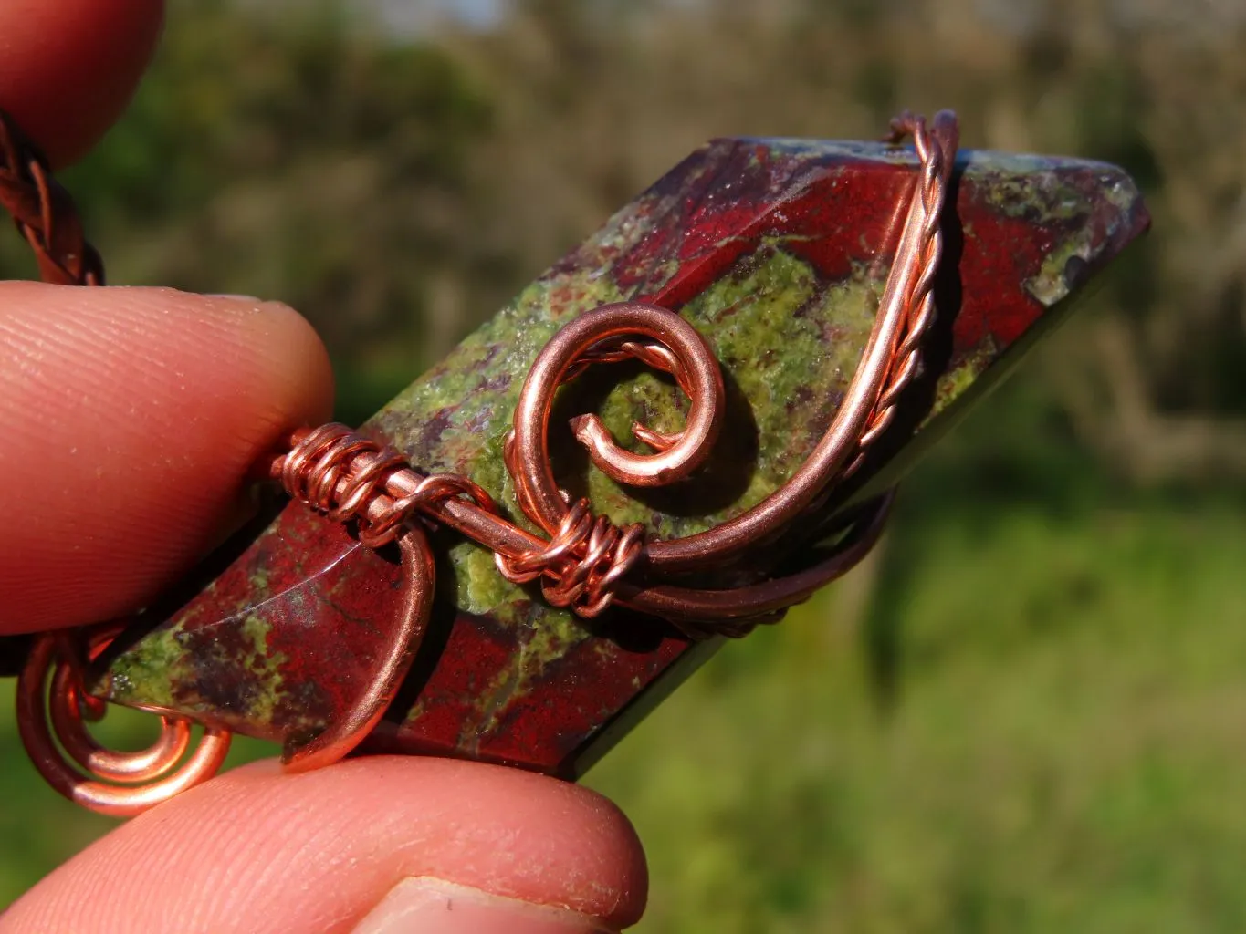 Polished Rare Bastite (Epidote & Piedmontite) Dragon Blood Stone Free forms Set In Copper Art Wire Wrap Pendant - sold per piece From South Africa