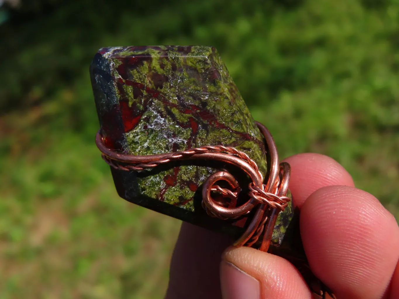 Polished Rare Bastite (Epidote & Piedmontite) Dragon Blood Stone Free forms Set In Copper Art Wire Wrap Pendant - sold per piece From South Africa