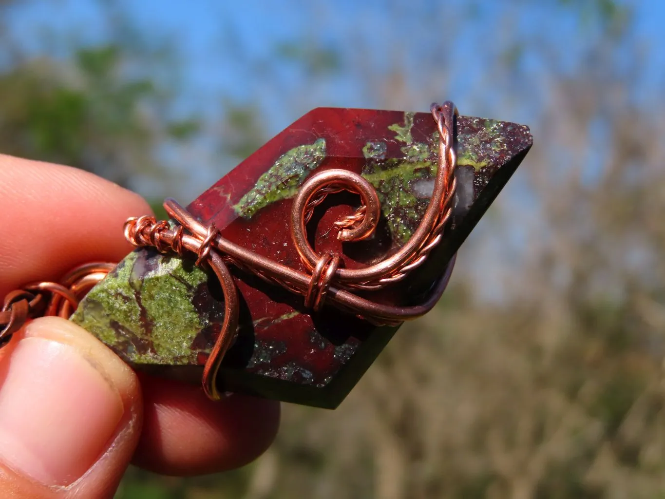 Polished Rare Bastite (Epidote & Piedmontite) Dragon Blood Stone Free forms Set In Copper Art Wire Wrap Pendant - sold per piece From South Africa